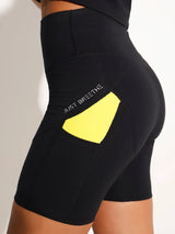Breeth Cotton Shorts — Black & Yellow side pocket detail